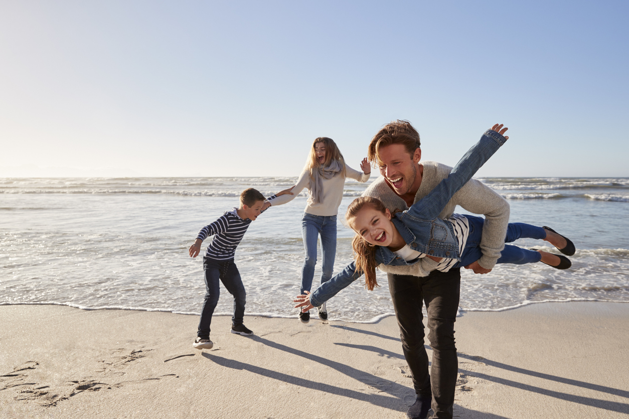 Families creating new memories this holiday season at the beach.